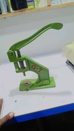 Button making machine