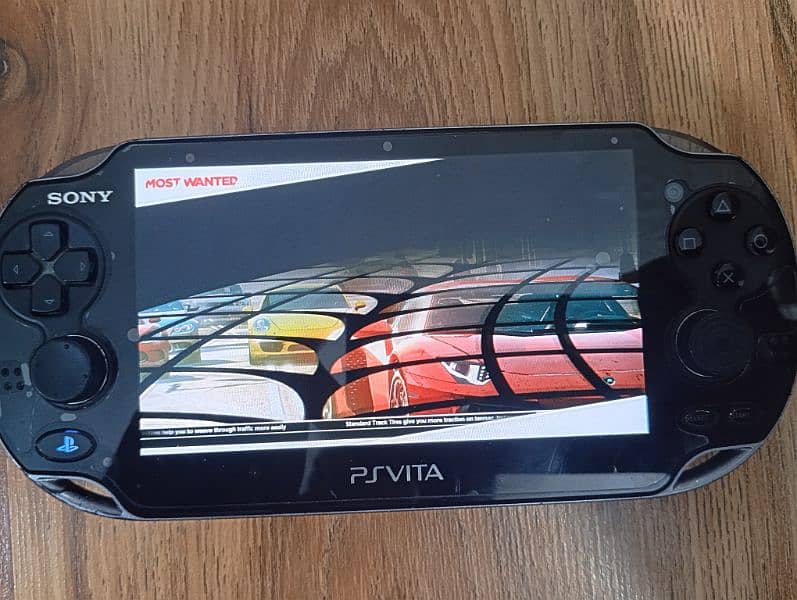 PS VITA 1000 OLED used but BRILLIANT CONDITION. 4