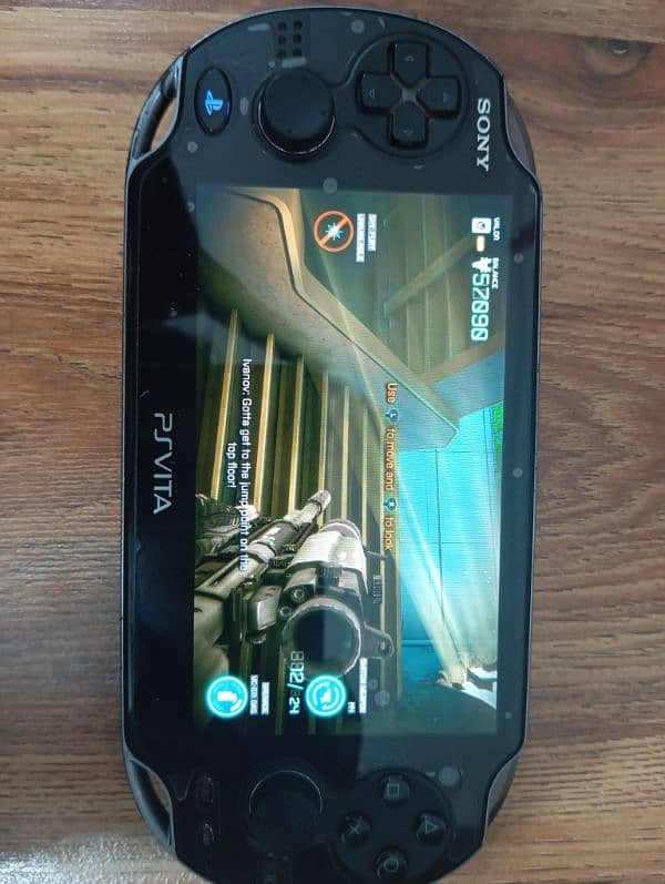 PS VITA 1000 OLED used but BRILLIANT CONDITION. 7