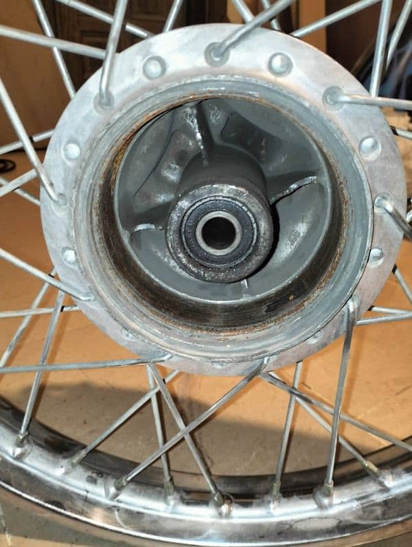 cg 125 1998 model Rim hub spoke brake plate 1