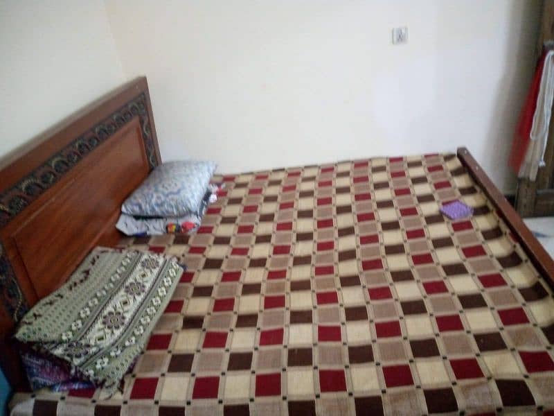 Double bed with mattress available for sale in good condition 1