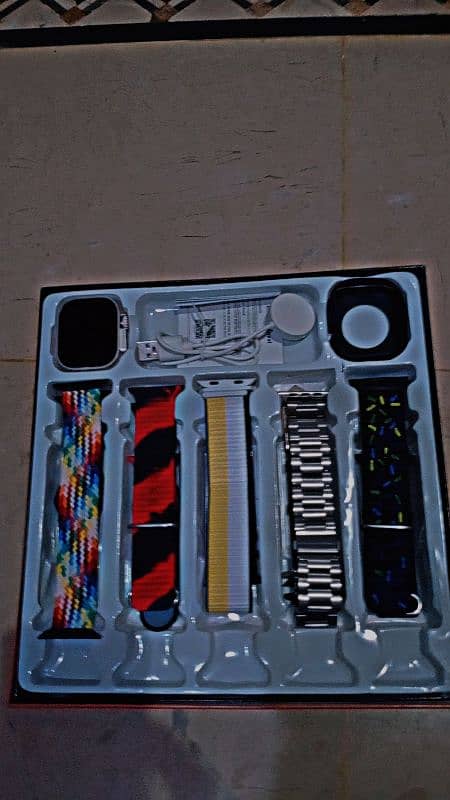 ultra watch with 10 straps and a case 2