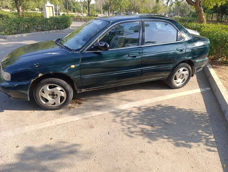 Suzuki Baleno 2000 alloy rim 7/10 condition reasonable demand 14