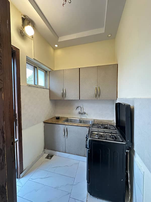 One kanal slightly used semi furnished bungalow available for rent in HBFChousingsociety 12