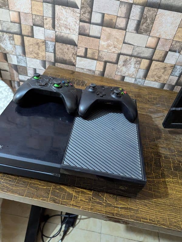 Xbox One with two controllers 0