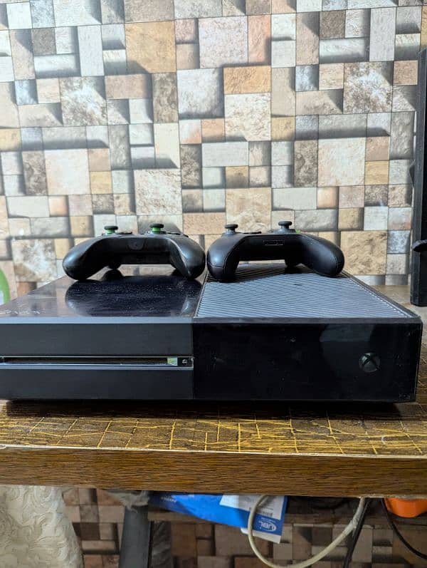 Xbox One with two controllers 1