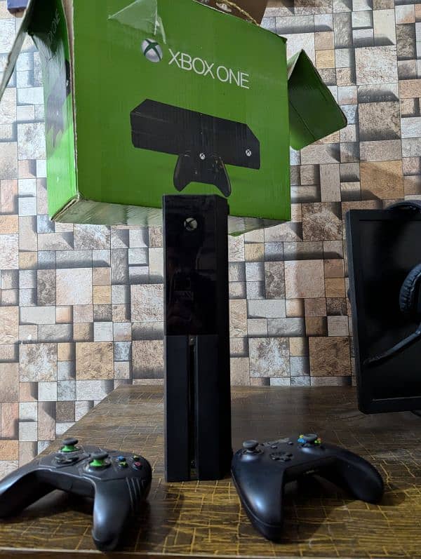 Xbox One with two controllers 5