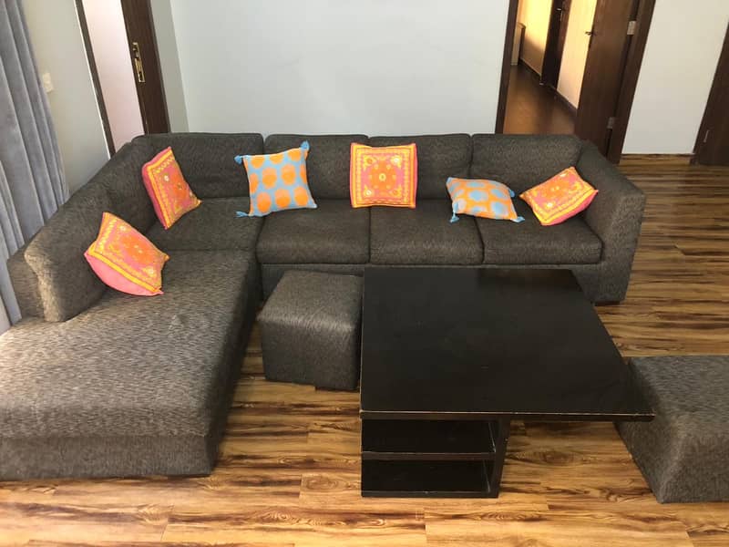 L shape sofa with center table 1