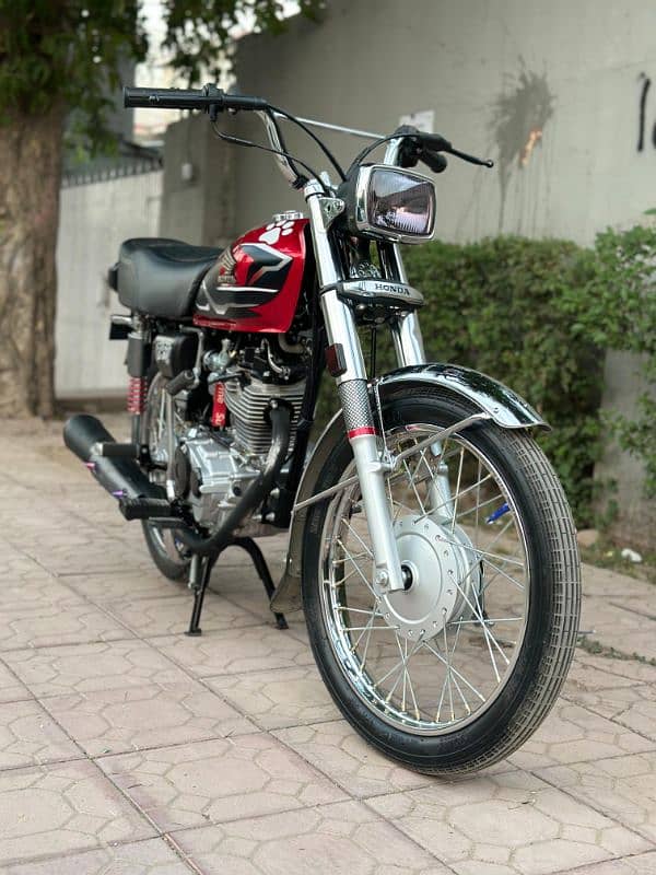 urgent sale brand new bike Honda 125 Islamabad registered 0