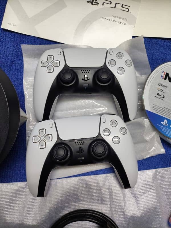 Playstation 5 with 2 controllers 2