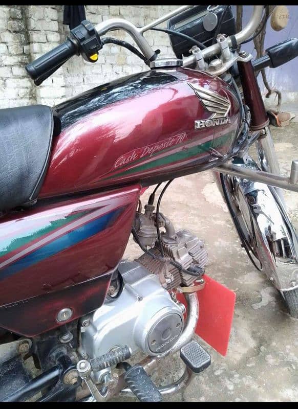 Honda cd 70: Japani . nut to nut genuine.  Faisalabad number. 3