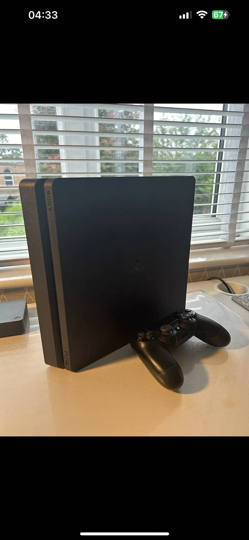 PS4 500 GB Slim with one controller 0