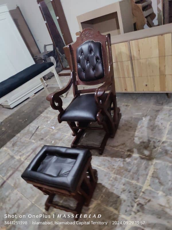 solid wooden rocking chair with foot rest available 10/9 condition 0