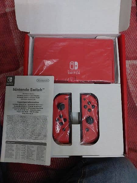 Nintendo switch oled mario red edition 1