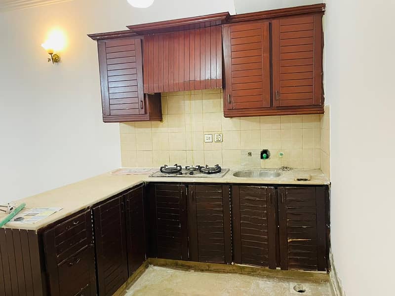 F-11 Markaz 1 Bedroom 1 Bath Tv Lounge Kitchen Car Parking Apartment Available For Sale In Islamabad 4