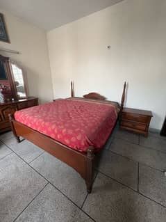 king bed with nightstand and mirror