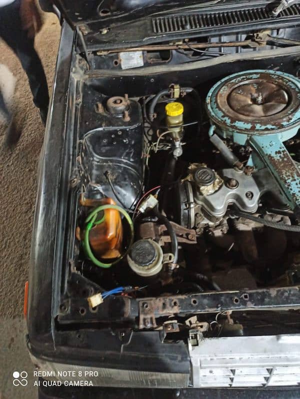 Nissan Sunny 1984 CNG petrol amplifier woofer 17