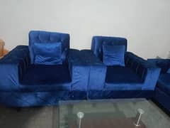 sofa set with centre table and matching curtains