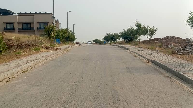 ONE KANAL PLOT AT TOP HEIGHTED LOCATION WITH BACK COMMANDING VIEW SECTOR C DHA PHASE 4 RAWALPINDI 2