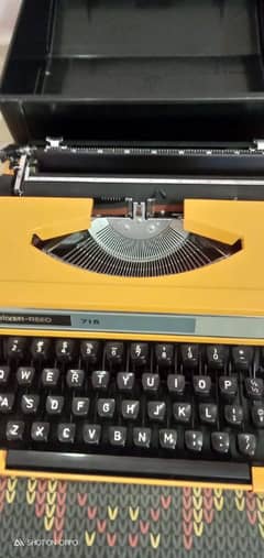 Silver Greed Portable Typewriter