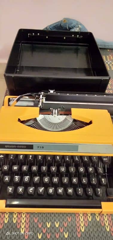 Silver Greed Portable Typewriter 1