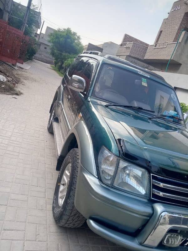 Toyota Prado  Automatic 4 by 4 sunroof and Turbo on model 2007 7