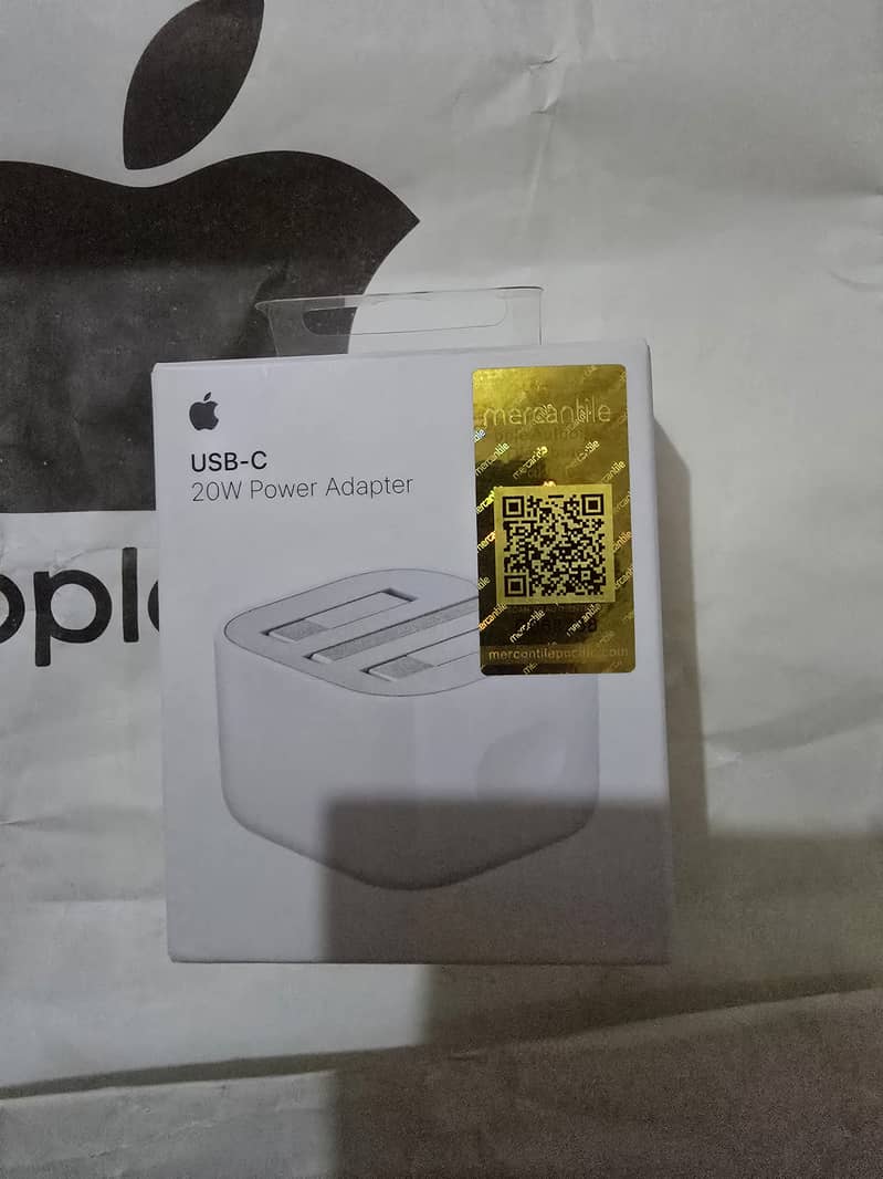 Apple 20Watt Power Adapter, with Apple Original lightning handfrees. 0