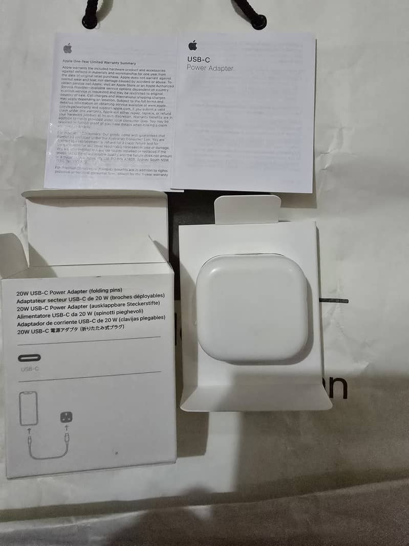 Apple 20Watt Power Adapter, with Apple Original lightning handfrees. 4