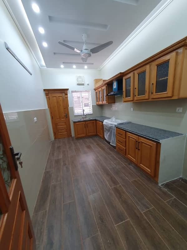 14 Marlas Upper Portion Tile Flooring Available Prime location of G-13 5