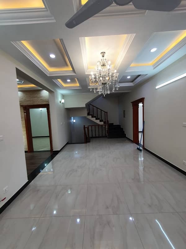 14 Marlas Upper Portion Tile Flooring Available Prime location of G-13 9