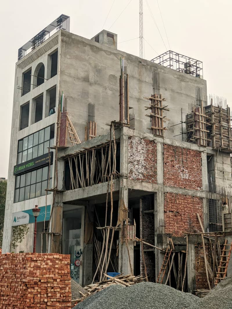 1 Kanal Grey Structure ,34000 Sqft Covered area ,Commercial Building With Basement+Ground+Mezzanine+1to5 Floors , Available For Sale Situated On Main Boulevard Lake City. 9