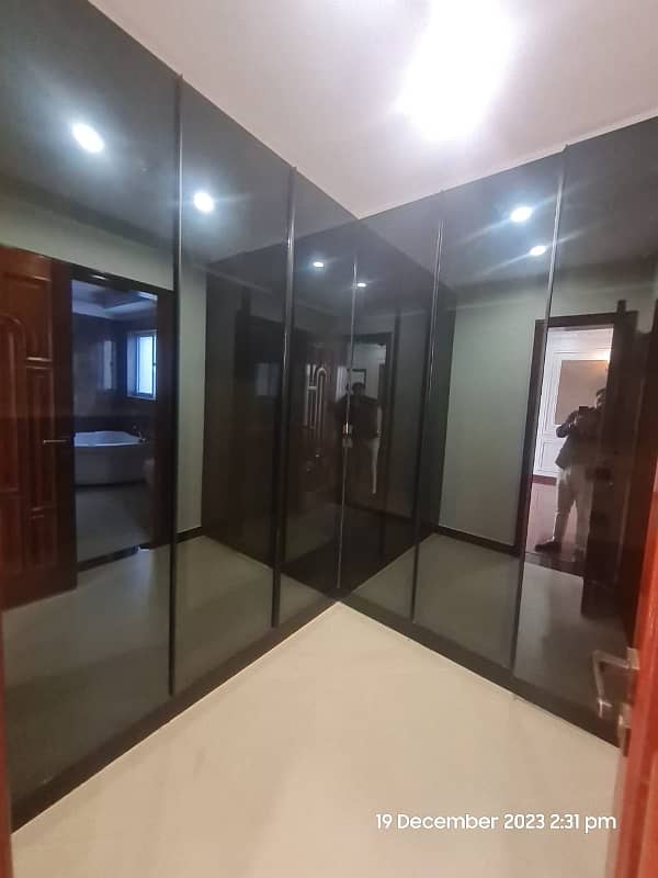 1 Kanal Brand New Super Hot Located Bungalow On Main Road With Full Basement And Home Theatre Is Available For Rent In The Best Block Of DHA Phase 6 Lahore Opposite To Lahore Garrison University 35