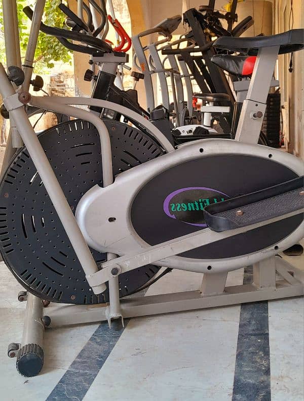 Elliptical cycle exercise machine elliptical air bike treadmill cycle. 0