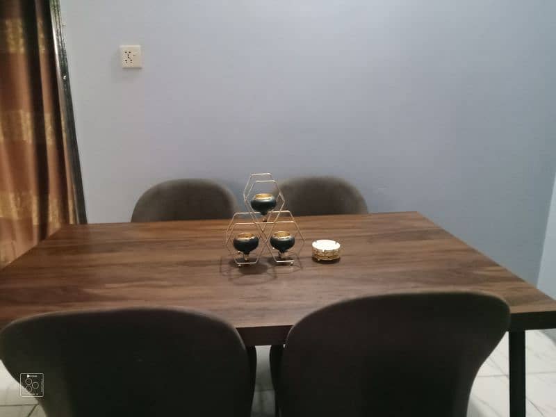 dining table with 4 brown chair and 3cotton 6