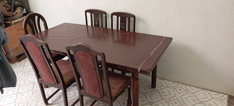 wooden table and chairs 0