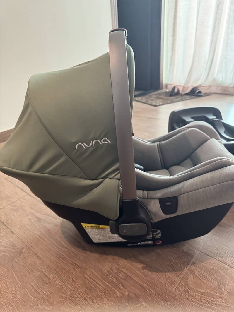 Nuna pipa lite carseat carrier with car seat base 1