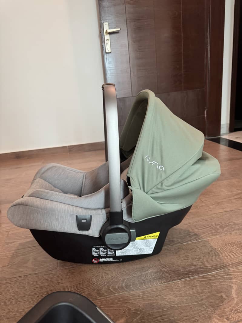 Nuna pipa lite carseat carrier with car seat base 6