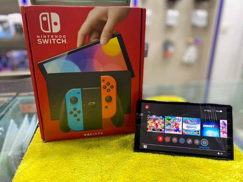 Nintendo switch oled Red and blue joycons complete box 2