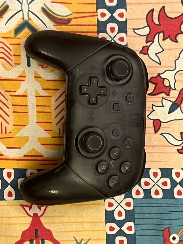 Nintendo Switch + Pro Controller + 1 Game 8