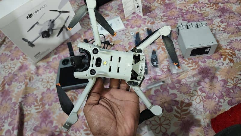 DJI Mini 4 pro board is damage  demand 180k only  one month ues . 18