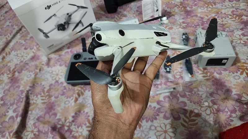 DJI Mini 4 pro board is damage  demand 180k only  one month ues . 19