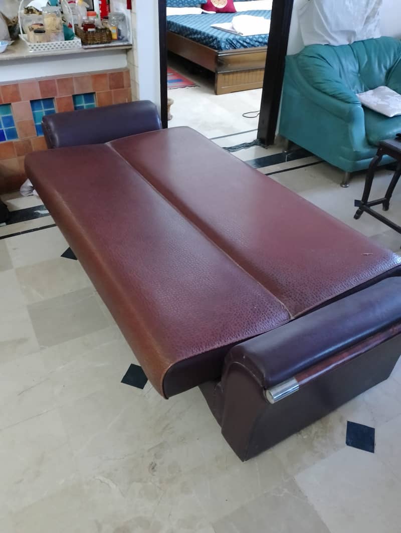 Sofa cum bed. 3 seater. leather upholstery. 1