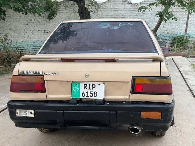 Mitsubishi Lancer 1987 exchange possible 7