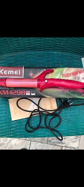 KEMEI Straightener and Curler 1