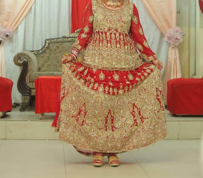 red and gold work bridal lehnga 0