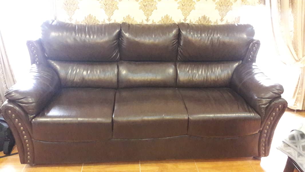 Leather5 seater sofa , chocolate brown colour. Negotiable. Verygood c. 6