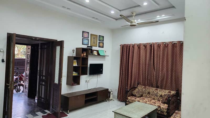 10 Marla Used & Maintained House is for Sale in Low Budget with Negotiation in Babar Block 6