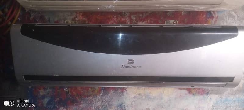 1.5 tan split AC Dawlance for sale same new condition 1