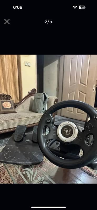 Steering wheel 180 with pedals 1