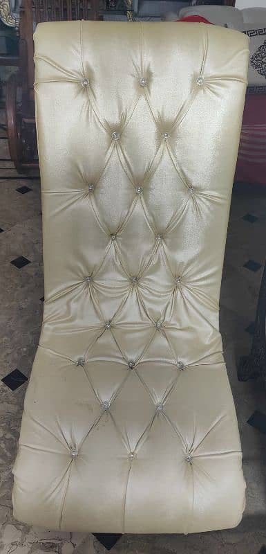 2 Hand Carved Room Chairs With A Glass Top Table. 4